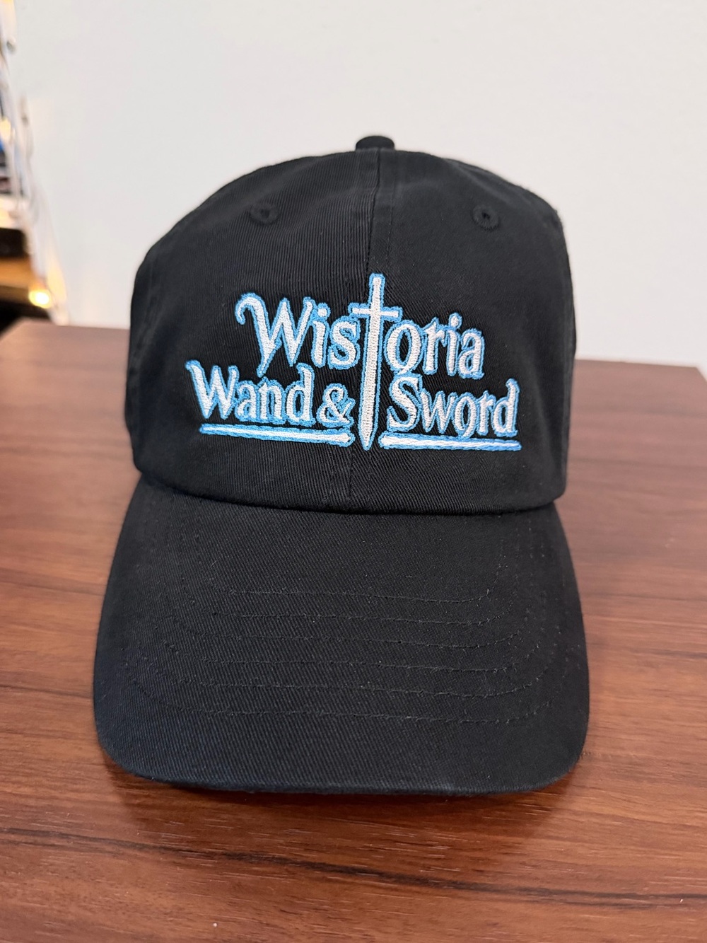 Wistoria wand and sword strap back hat